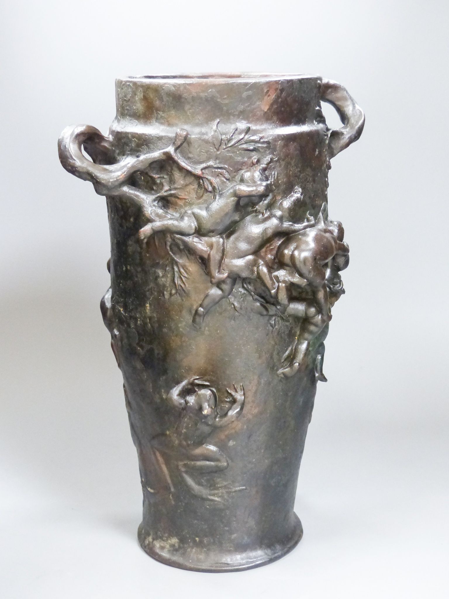 After G.J. Cheret. An Art Nouveau style bronze vase